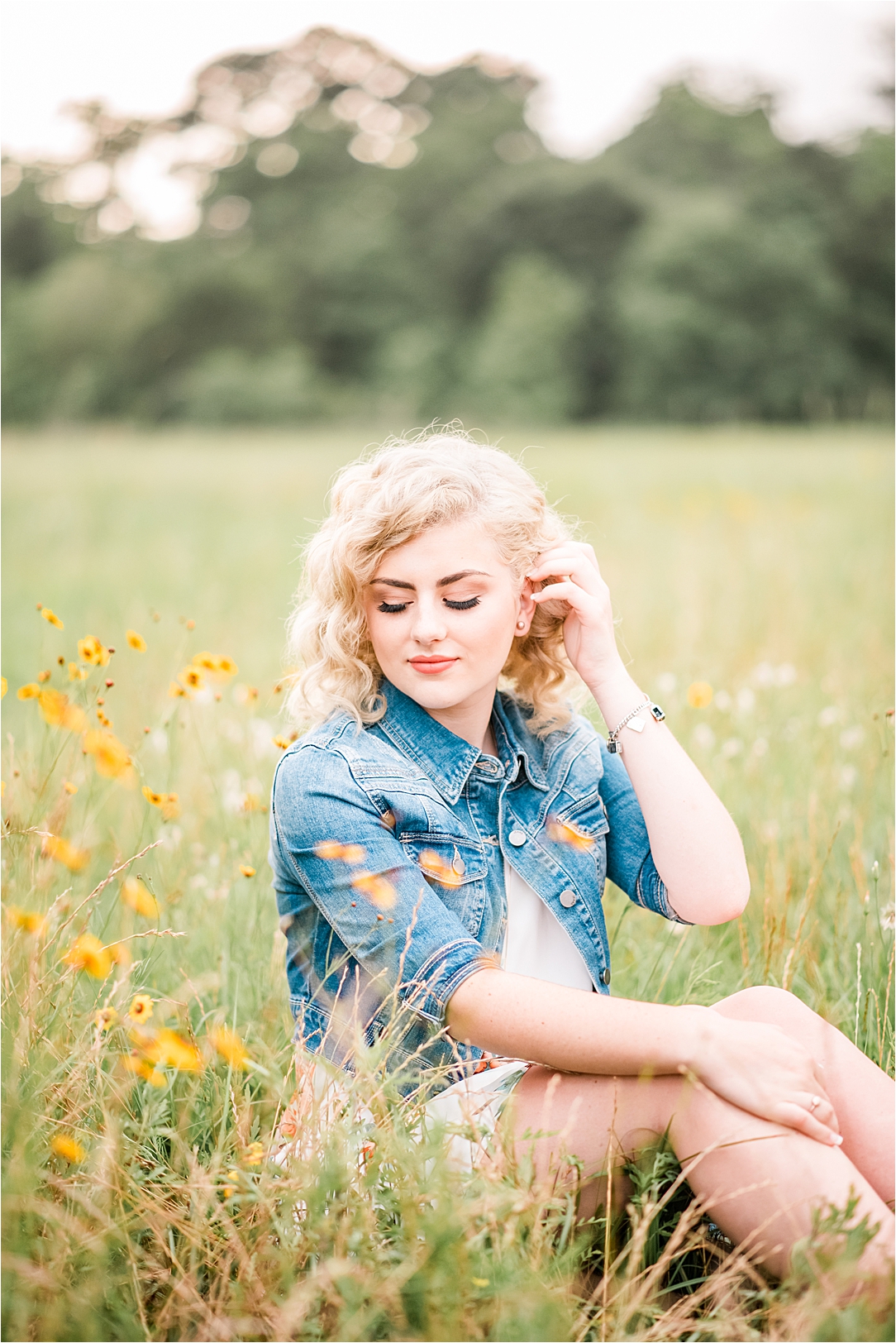 photo of a teen girl in a field of yellow flowers