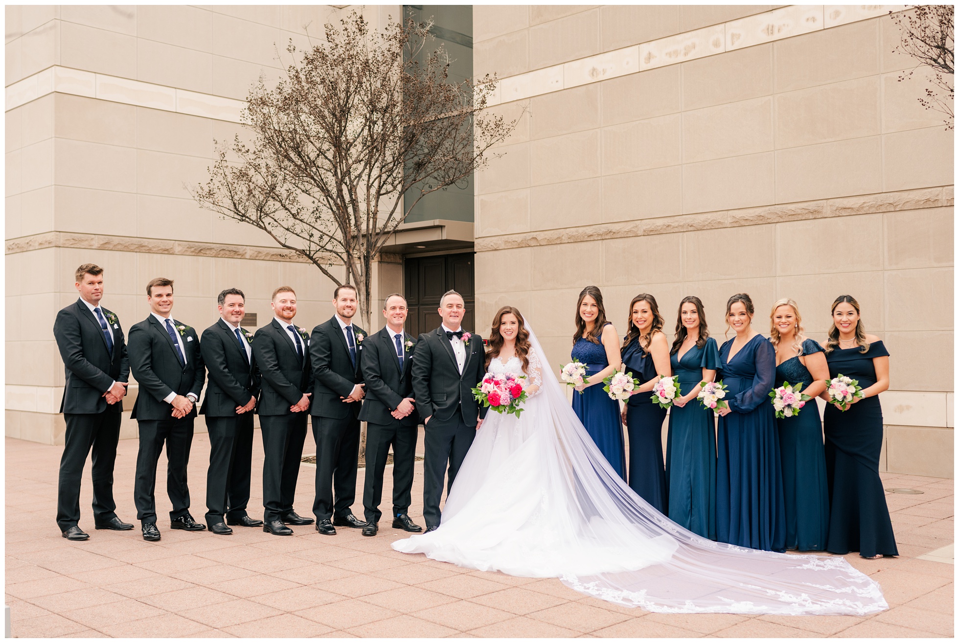 traditional wedding party photo outside the Co Cathedral of the Sacred Heart Houston.