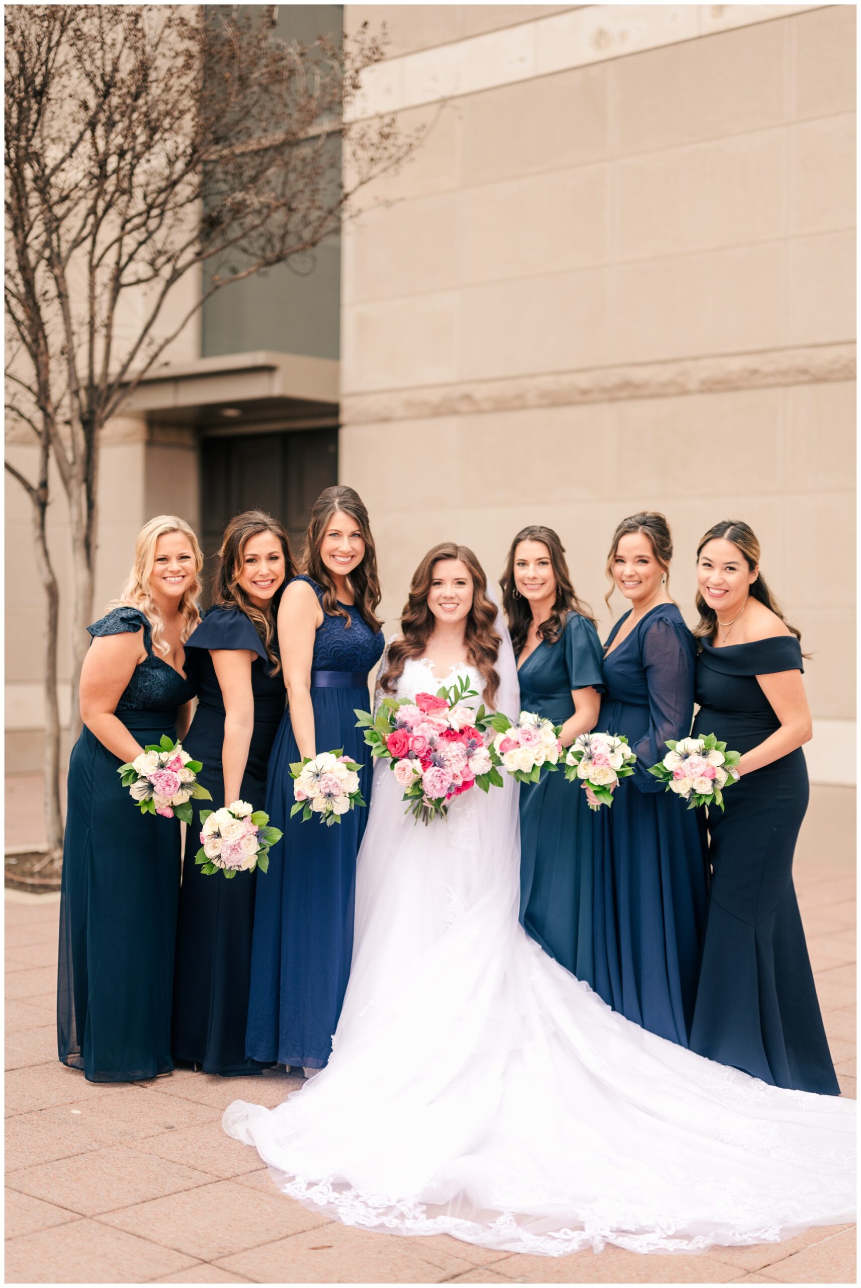 Bridemaids pose for a photo outside the Co Cathedral of the Sacred Heart in Houston.