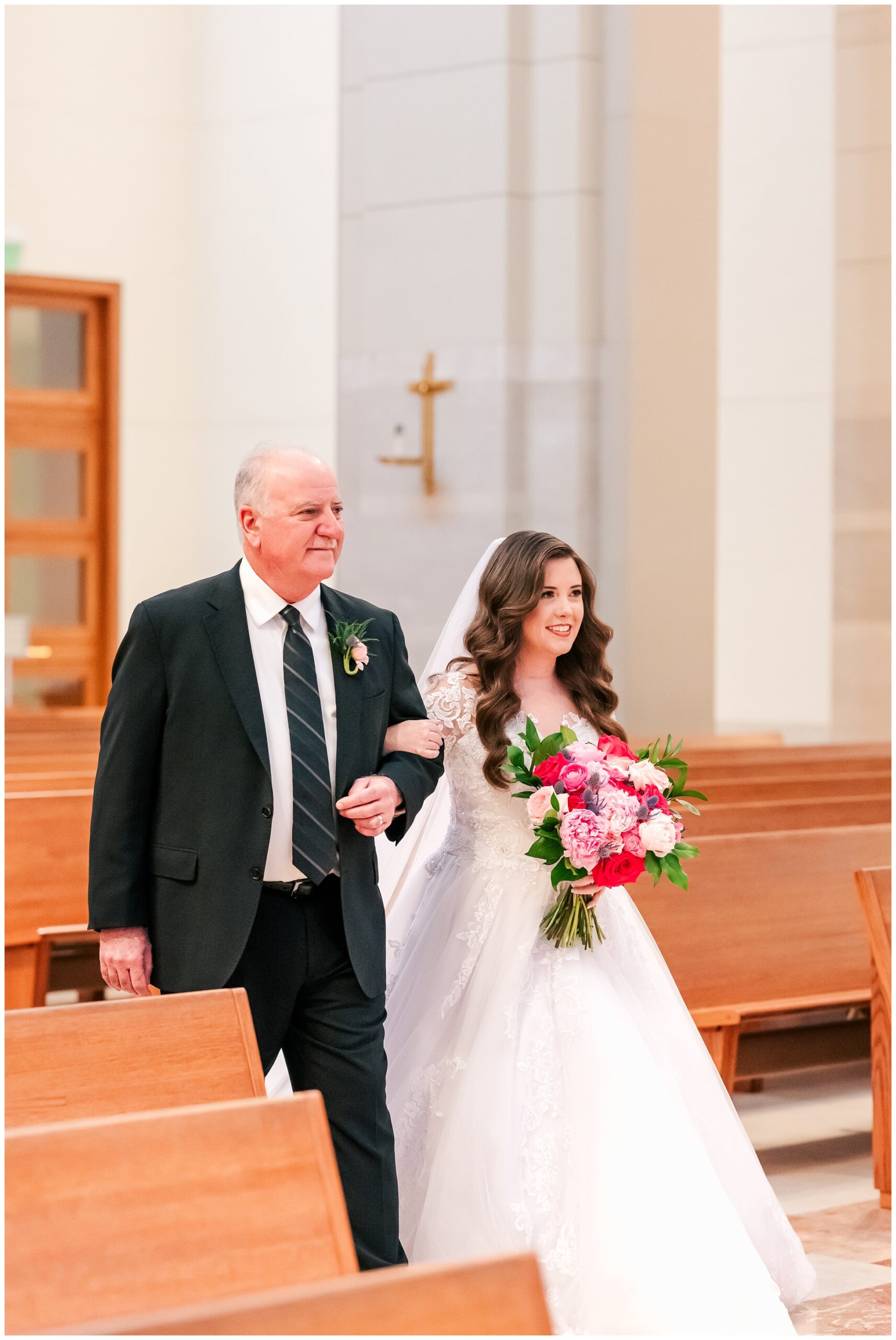 Father walks his daughter down the Aisle at Co Cathedral Houston.