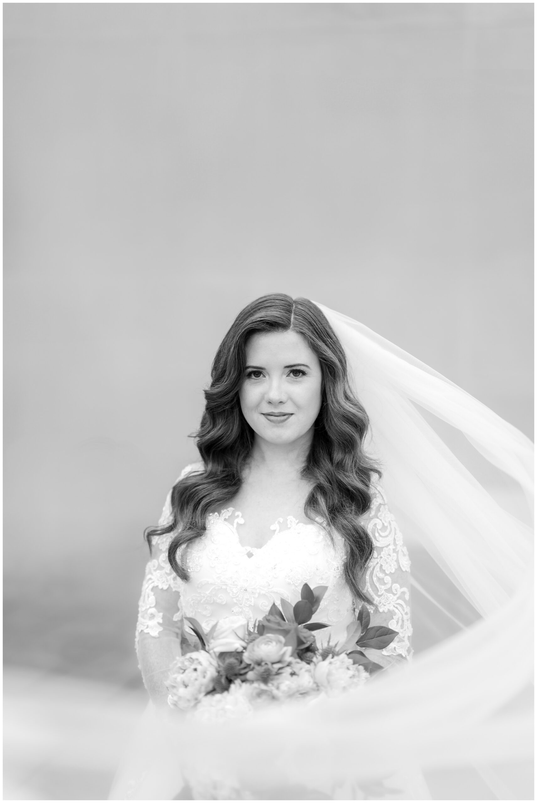 Bridal Portrait with long swooping veil of Bride after her Houston Church wedding.